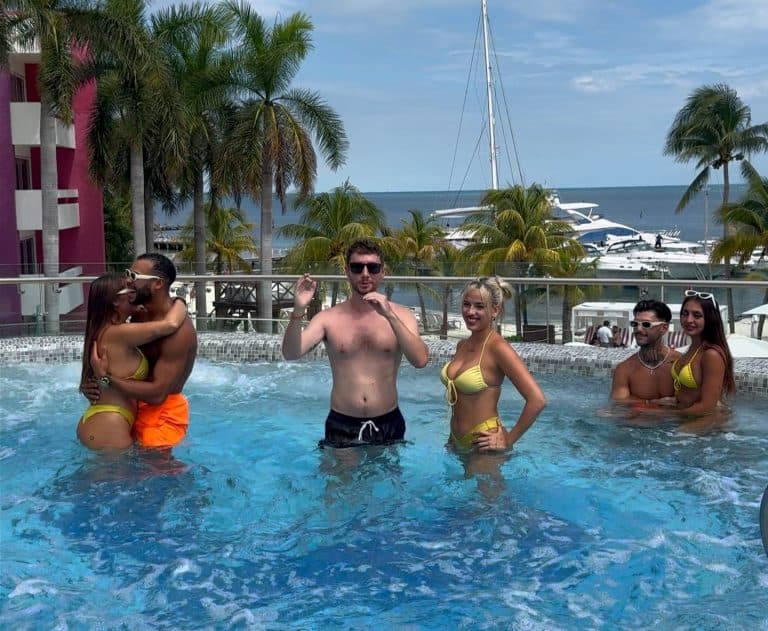 Sunny poolside gathering with friends at a luxury hotel near the marina in tropical paradise.