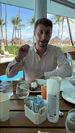 Javier reviewing food at a Punta Cana all-inclusive restaurant